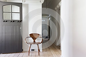 Simple decor of classic wooden chair in apartment entry horizontal