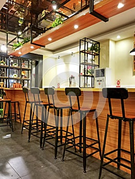 Bar interior with empty stools photo