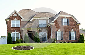 Simple Elegance Two-Story Brick and Cobblestone Home