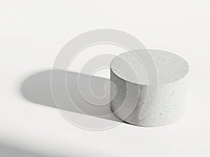 A simple yet elegant white cylindrical object casting a soft shadow on a plain background