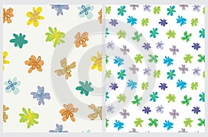 Simple Floral Seamless Vector Patterns Set with Blue, Yellow,, Green and Orange Hand Drawn Flowers.