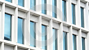 Simple generic office building detail, glass windows, closeup, modern business architecture details up close, simple background