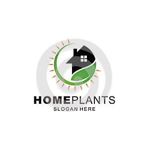 Simple Green Leaves and home Logo Template wih light sun