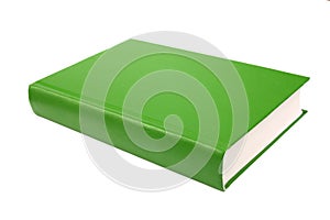 Thick green book isolated on white background photo