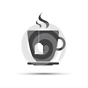 Simple grey cup of tea with a tea gab tag photo