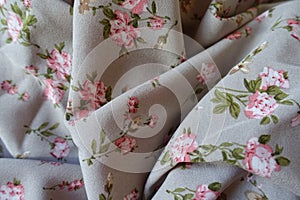 Simple grey rayon with old-fashioned floral print in soft folds