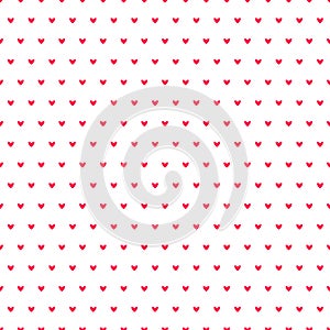 Simple hearts seamless vector pattern. Valentines day background. Flat design endless chaotic texture made of tiny heart silhouett