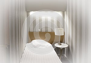 Simple hotel room, single bed