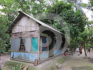 village hut , rural Barishal, Bangladesh photo