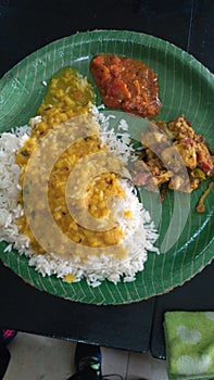 A simple Indian food rice, chatni and vegetable curry