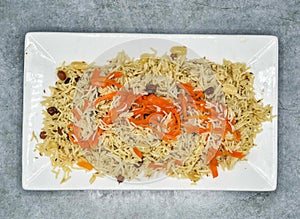 Simple kabuli pulao served in dish isolated on background top view of indian spices and pakistani food