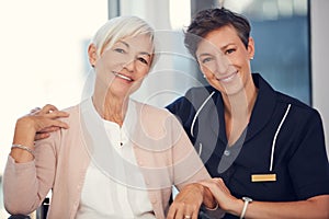 Simple kindness can put a smile on someones face. Cropped portrait of a young female nurse embracing a senior woman