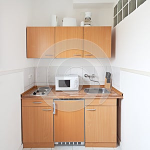 Simple kitchen with furniture set