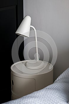 Simple lamp on bedside table