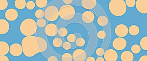 simple and modern abstract pattern featuring overlapping oval shapes in a light orange hue against a light blue background photo