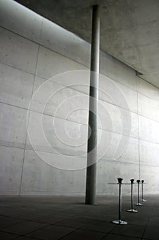 Simple modern concrete interior with tables