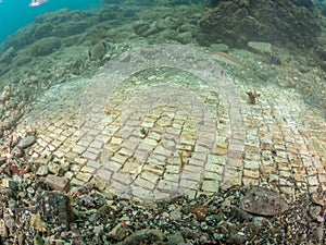 Simple mosaic in Emperor Claudioâ€™s Ninfeum. underwater, archeology