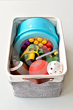 Simple organized storage baskets for easy clean up of toys and books for kids and modern living