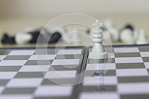 Simple Photo illustration for War, battle or politic situation concept, the winner, plastic magnetic small chess, critical