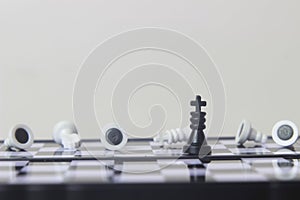 Simple Photo illustration for War, battle or politic situation concept, the winner, plastic magnetic small chess, critical