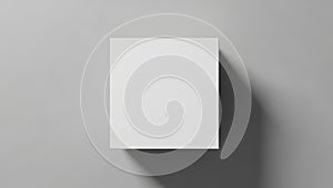 Minimalist white square object casting a shadow on a gray background