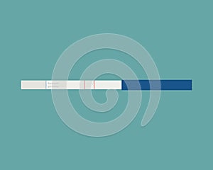 A simple pregnancy test on a green background