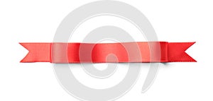 Simple red ribbon on white background, top view. Festive