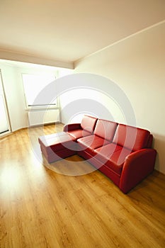 Simple room with red sofa