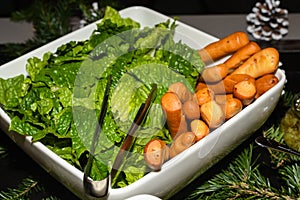 Simple salad lettuce bowl no dressing, served during brunch buffet in hotel. Bruschetta Breadstick