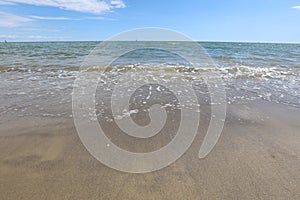 simple sea background with sandy beach ideal for use as a neutra