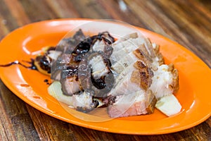 Simple serving of Chinese style roast pork or siew yuk