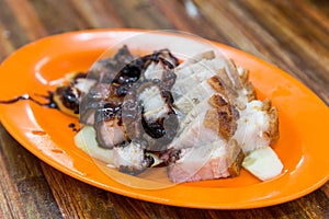 Simple serving of Chinese style roast pork or siew yuk photo