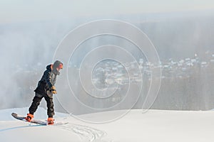 Simple snowboarding trick. copy space. ful length photo