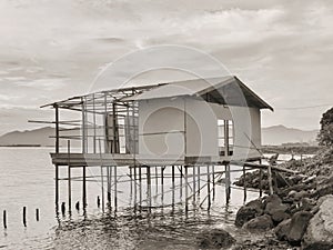 Simple stilt house structure on morowali beach