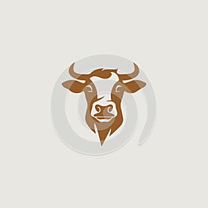 a simple and stylish logo that symbolically uses a cow