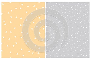 Simple Trangle Vector Patterns. White Triangles on a Pale Yellow and Light Gray Background.