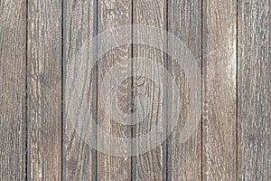 Simple used worn outdoors wooden table thin planks texture, wooden planks wall background surface structure up close, backdrop