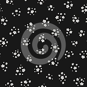 Simple vector monochrome seamless pattern with small flowers. Ditsy texture