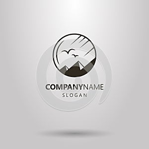 Simple vector round logo of mountain peaks landscape with birds