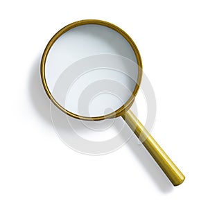 Simple vintage brass magnifying glass isolated