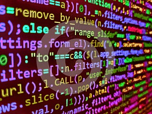 Simple website HTML code with colourful tags in browser view on dark background. Data bits computer bits, shadow and dark vignette