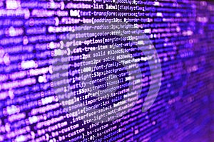 Simple website HTML code with colourful tags in browser view on dark background. Developing programming and coding technologies.