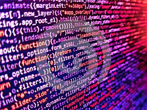 Simple website HTML code with colourful tags in browser view on dark background. Web abstract programming and created virus on