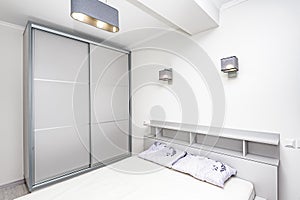 Simple white empty bedroom interior