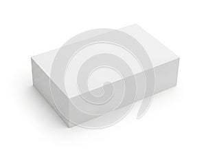 A simple white rectangular block on a flat surface
