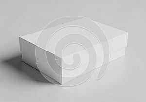A simple white rectangular box casting a subtle shadow isolated on white background