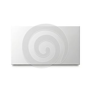 Simple white rectangular object with subtle shadow on plain background