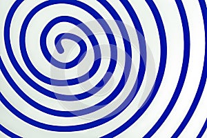 Simple white spiral on blue background