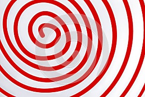 Simple white spiral on red background