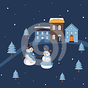 Simple winter composition with cute snowman and snow woman